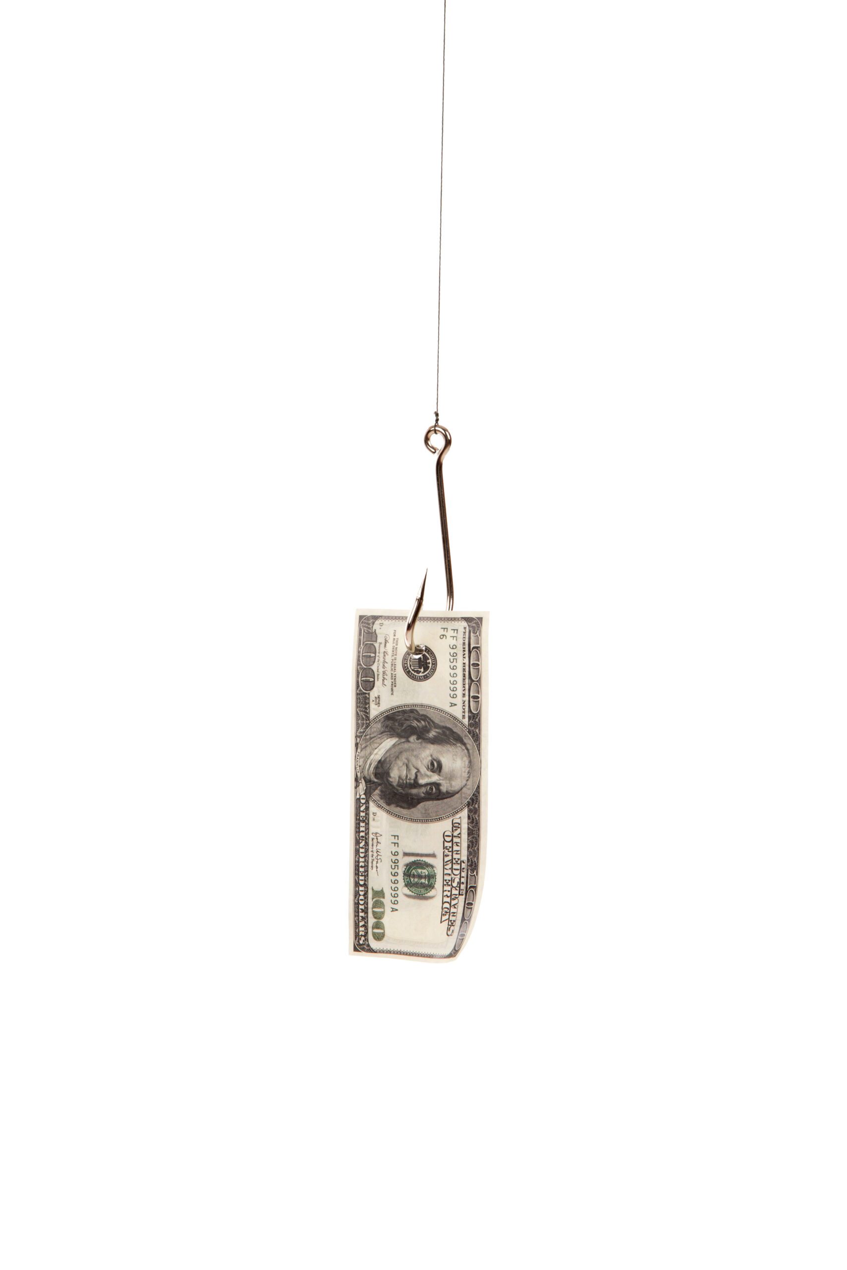 unclaimed money 100 dollar bill on fishing hook